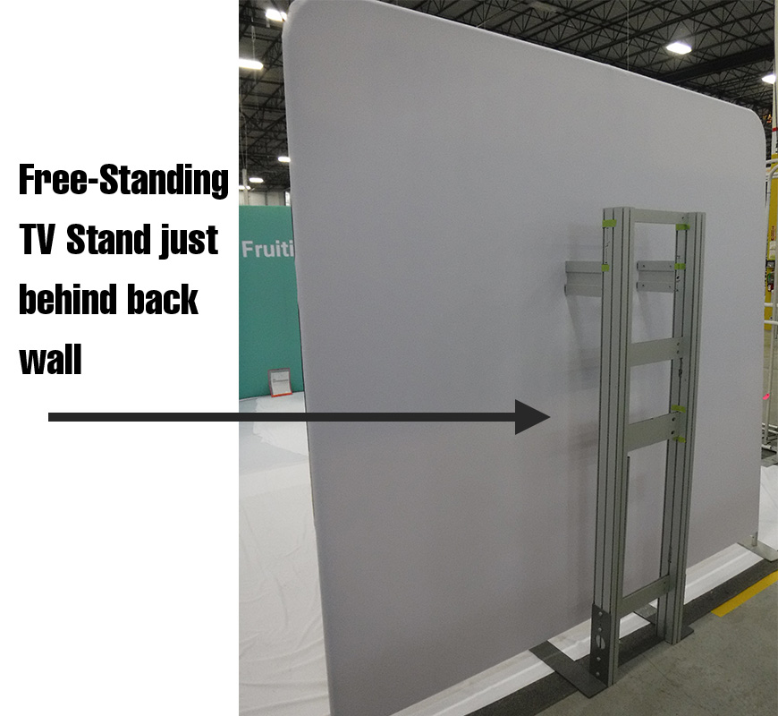 Free-Standing TV Stand just behind Trade Show Back Wall